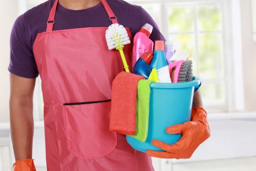 Professional cleaning team completing after builders cleaning in a modern property
