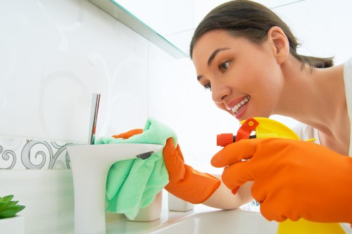 Cleaner preparing supplies for end of tenancy cleaning